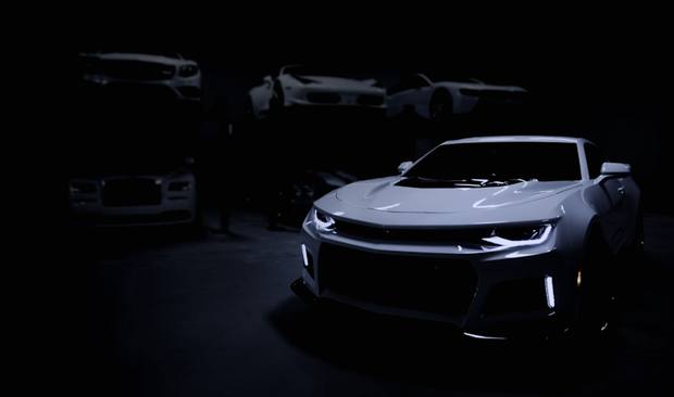 Cars in a dark showroom